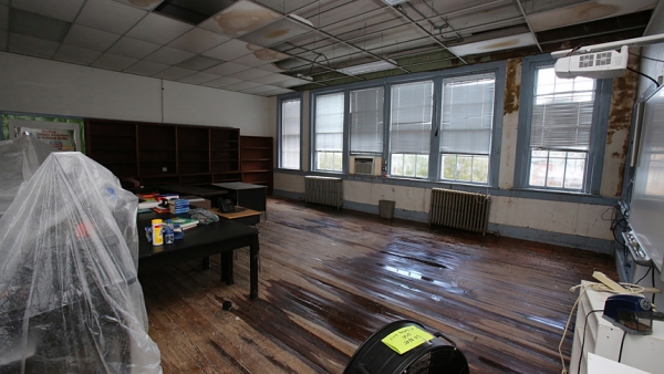 Water still remains on the floor of a middle school classroom Sept. 28 at St. Mary School in Wilmington. (CNS photo/Bob Roller)